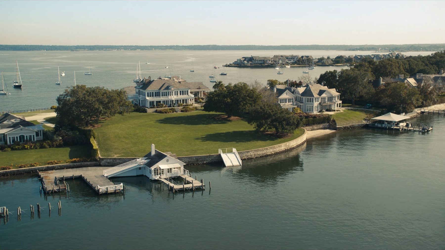 Waterfront homes with private docks along a calm shoreline
